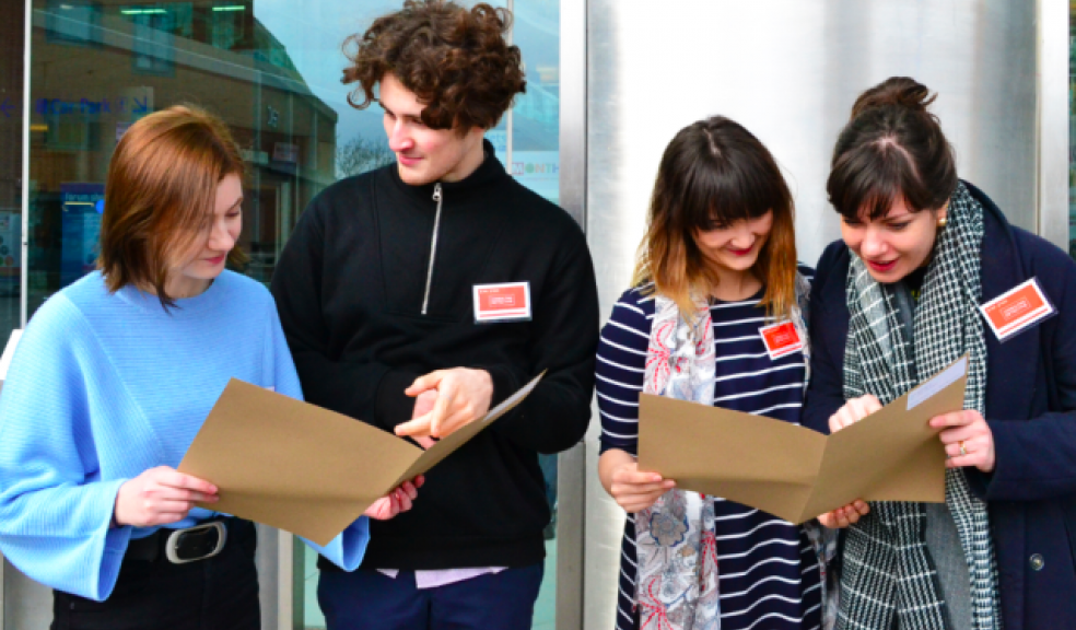Intrepid sleuths study a casefile in Norwich city centre- Left to right Eve Mahoney 17- Will Lubbock 18- Laura Nazmdeh 27- Caroline Bidewell 31