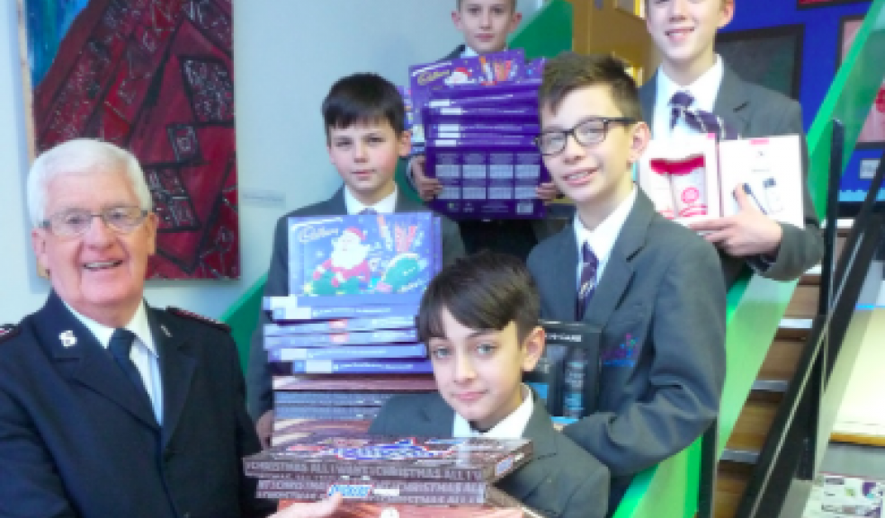 Photo caption: From left to right: Tom Saunders from the Salvation Army with Plympton Academy students, on left hand stairs; Lee Alderslade (bottom) Aiden Symons (top) and on the right side of the stairs Charlie Pulleyblank (bottom), Owen Fifield and Charlie West (top).