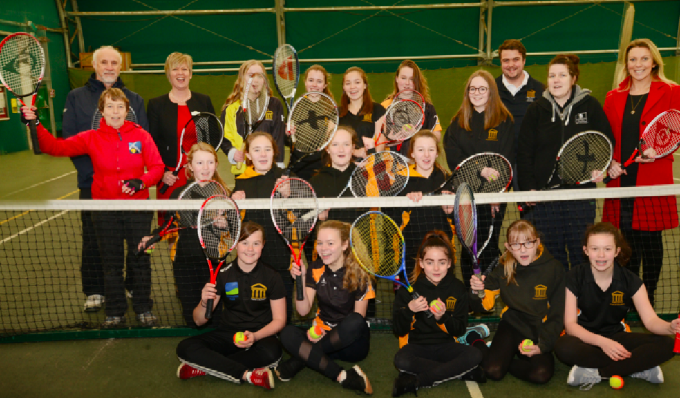 Georgie Loosemore (LTA), Louise Kelley (Plymouth City Council), Dominic Osborn (Hele’s School) far right with Justine Mason (Head, Hele’s School) and Peter and Jane Wilson (Plympton Tennis Club) with year 9 tennis students from Hele’s School