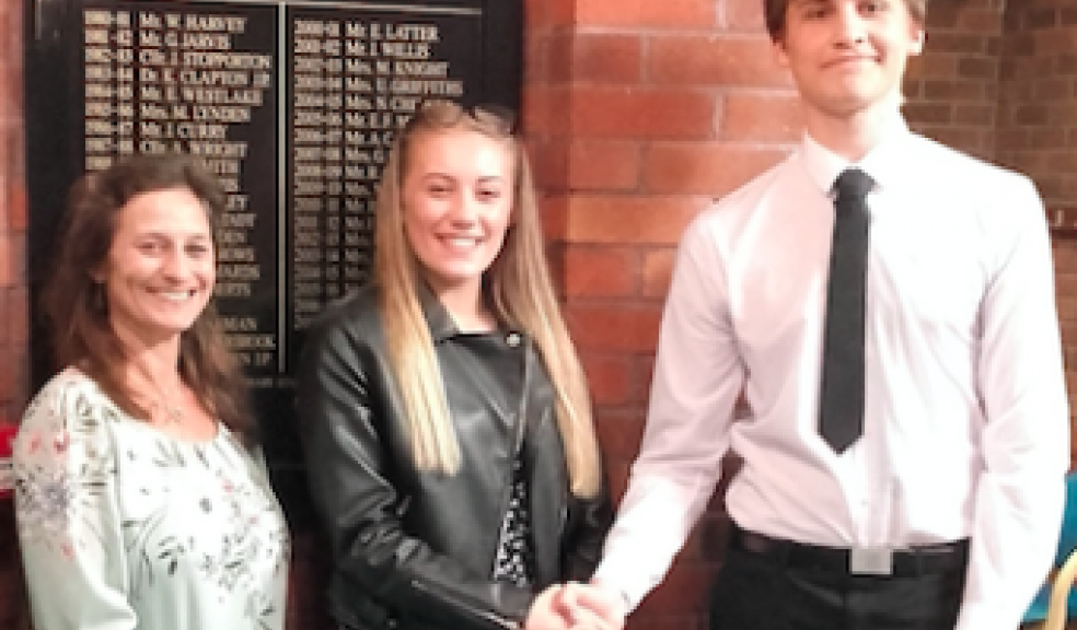 Isaac Hudson congratulates his successor as Youth Ambassador, Molly Disney, who will work closely with the next Stannator of Plympton Natalie Harrison (also pictured) when they both take office in June.