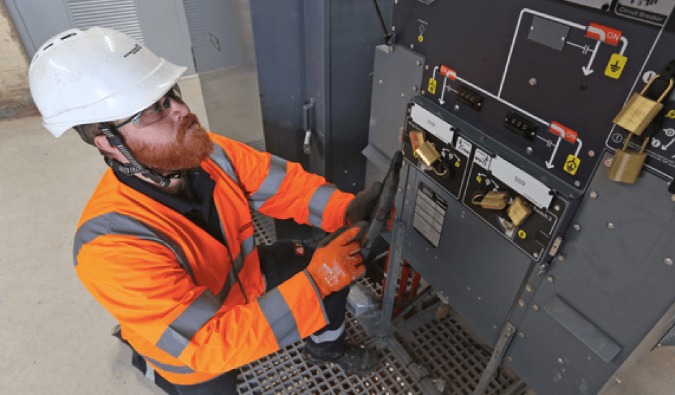 Fitter Dan Whiting carrying out pre-commissioning checks on the HV switchgear.