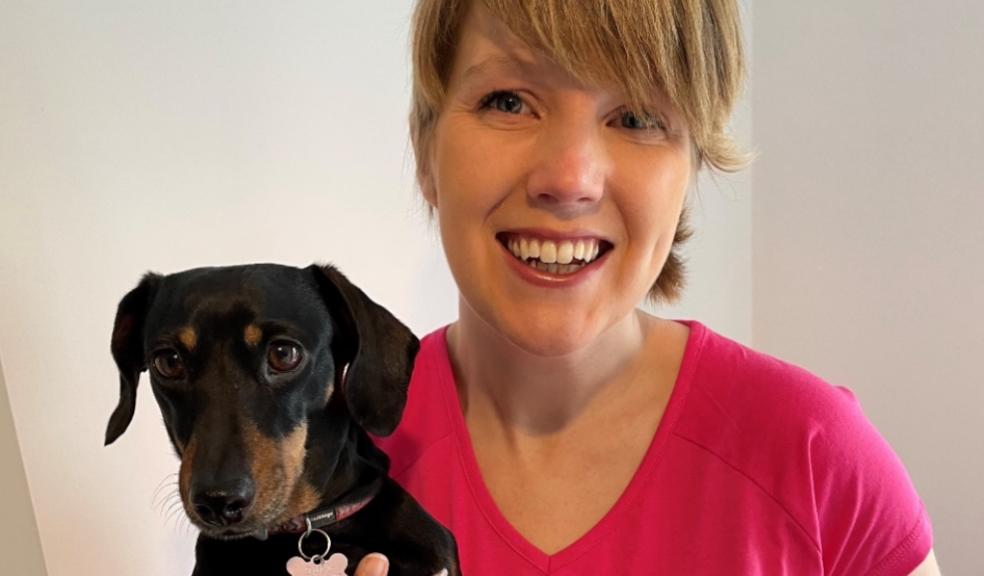 Cancer survivor Heather Duff with her minature dachshund Parsnip 