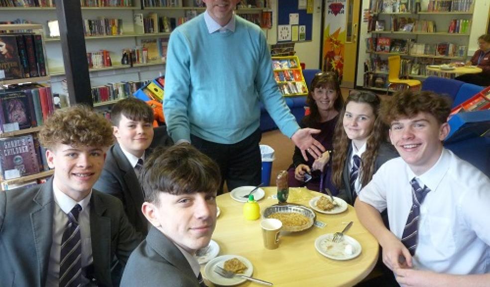 Left to Right: Jake Proctor, Louis Shearstone, Toby Diston, Reverend Andy Day, School Librarian Mrs McGlinchey, Shayla Hilton and Kiel Hilton.