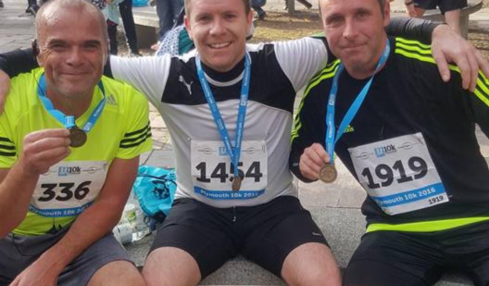 Stuart Kerry (right) with work colleagues Mark (left) and Fergus (centre).
