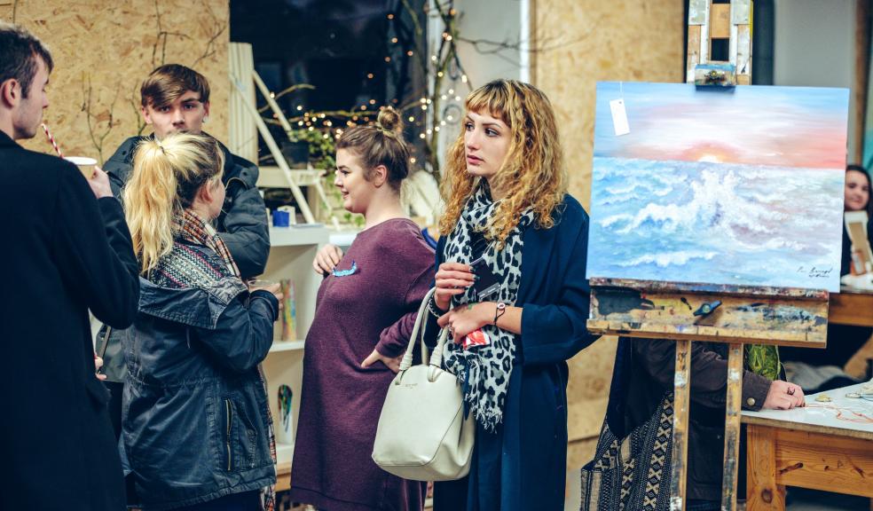 Students selling original paintings at Design to Sell 2016