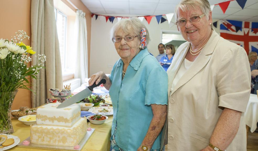 Tamar resident Betty Paddon, aged 98, cut the birthday cake alongside her daughter Sally Ellam