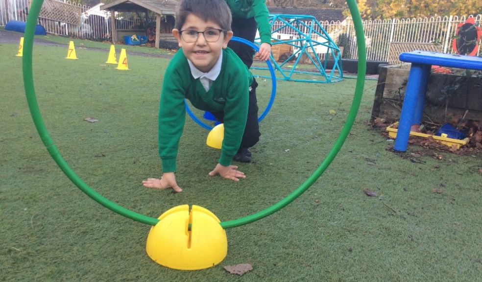 Pupils at Willowbank Primary School in Cullompton enjoy the new equipment funded by Taylor Wimpey.