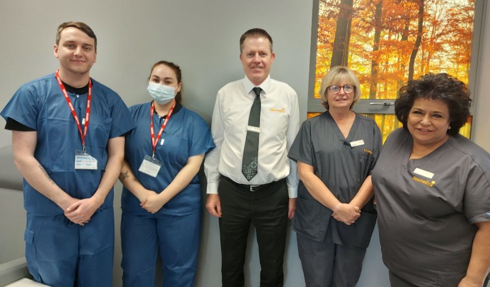 Clinic staff with some of the students.