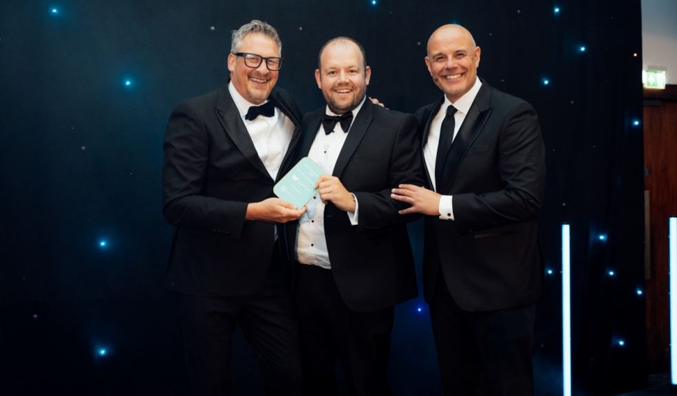 Will Jordan (centre) receives MAT Excellence Award for IMP Software.