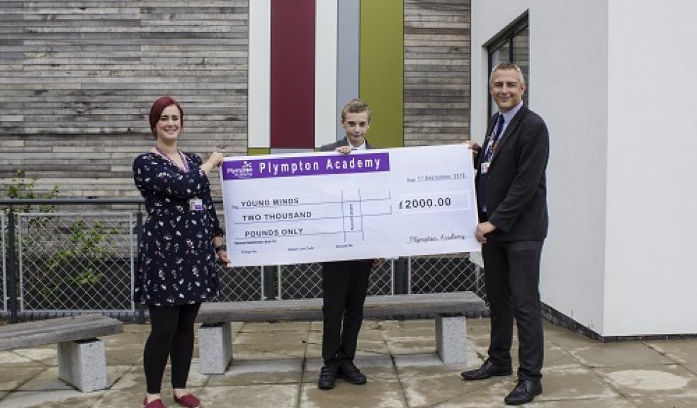 Photo caption: Ian Hartley (Assistant Principal), Sara Clyndes (English Teacher) and Ben Bacon (Year 9 student) with the cheque.
