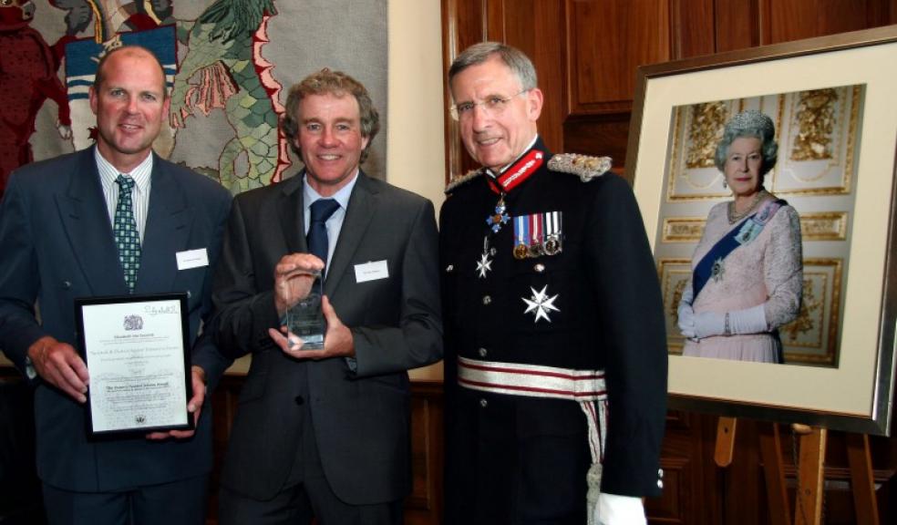 The Lord Lt of Devon presents the Queen’s Award to Richard Walker and Paul Johnson representing the Tavistock & District Outdoor Education Forum