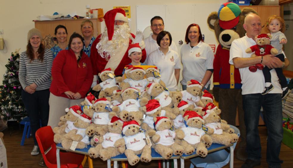 Marshall Marren (4) with representatives from Becca’s Bear and Play Specialists from Derriford Hospital