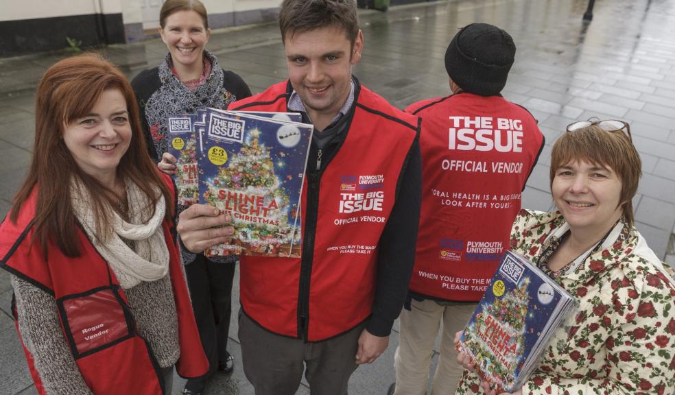 Big Issue vendor Lewis with, left to right, Sue Owen (Big Issue Office Coordinator) and Nicola Brown and Wendy Smith (Peninsula Dental Social Enterprise).