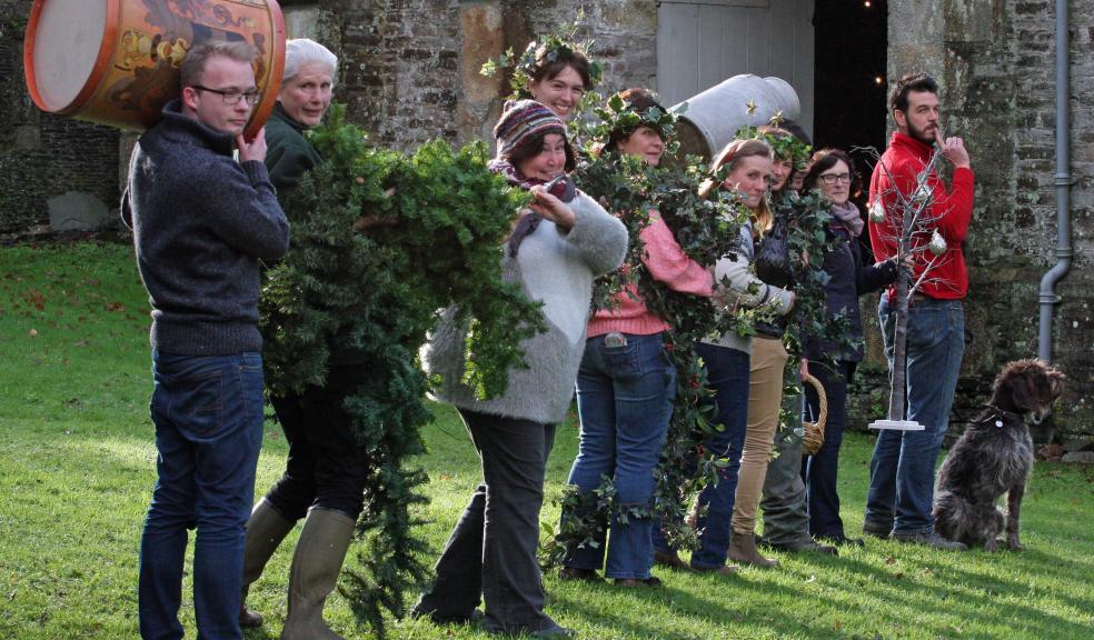 The team at Buckland Abbey getting ready for the 12 Days of Christmas complete with greenery, milk churns, drums and pipers. Credit: James Breslin