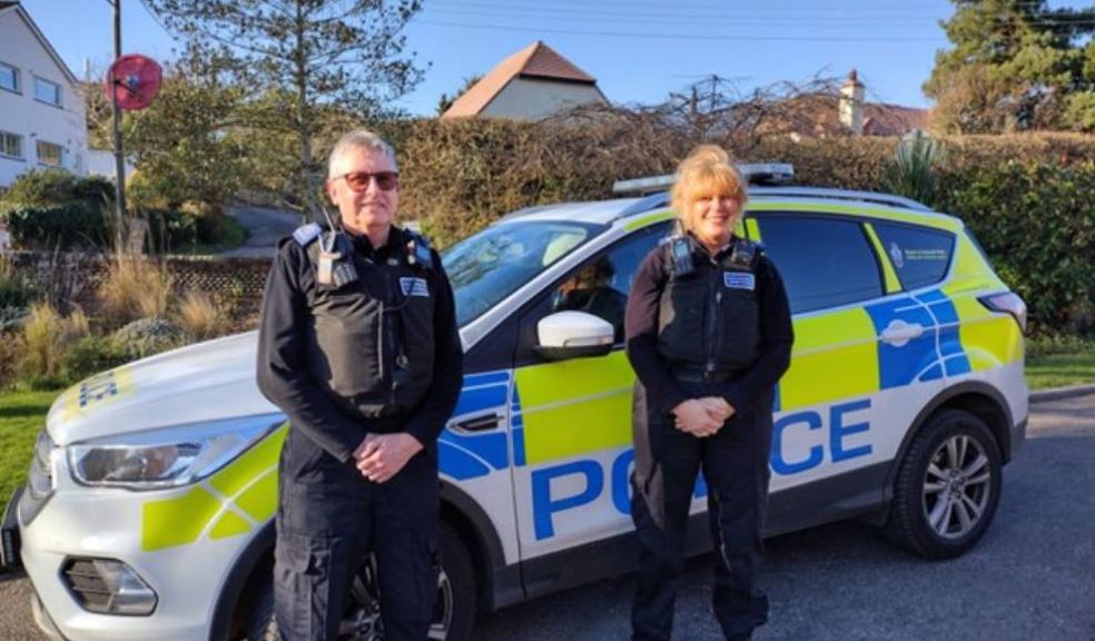 Photo: shows PCSOs Colin Balch and Karen Capey in Budleigh Salterton