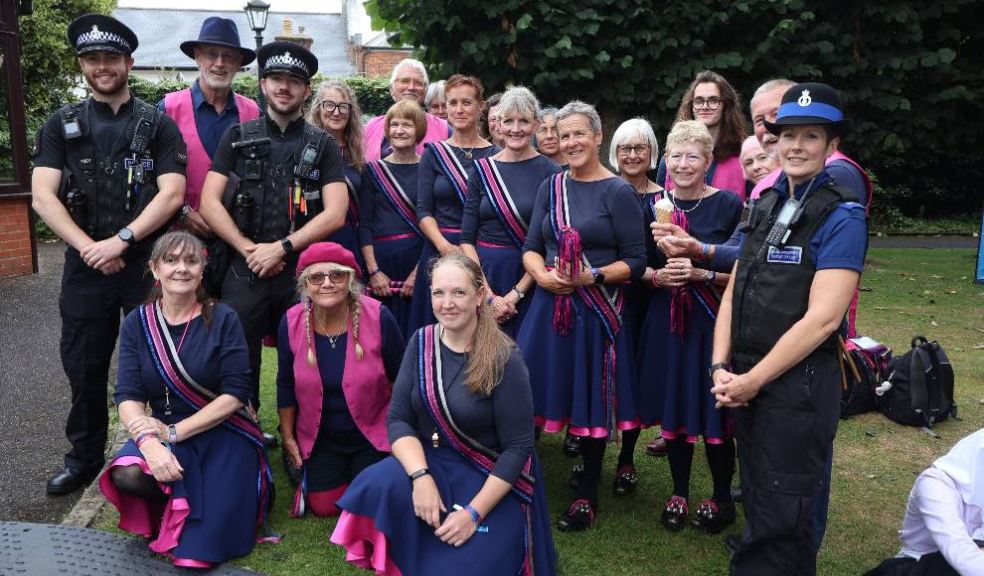 Photo Caption: Pic shows PCs Ross Buckler and Tom Driver (left) with PCSO Sarah Reece (right) and members of the Liberty Hill North West Morris group at the recent Sidmouth Folk Festival