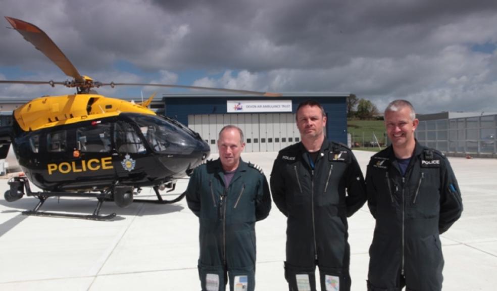 The police NPAS helicopter with (from left) Captain Ian Kingston and Tactical Flight Officers PC Rob Caught and PC Phil Knowles at the new airbase at Exeter Airport.