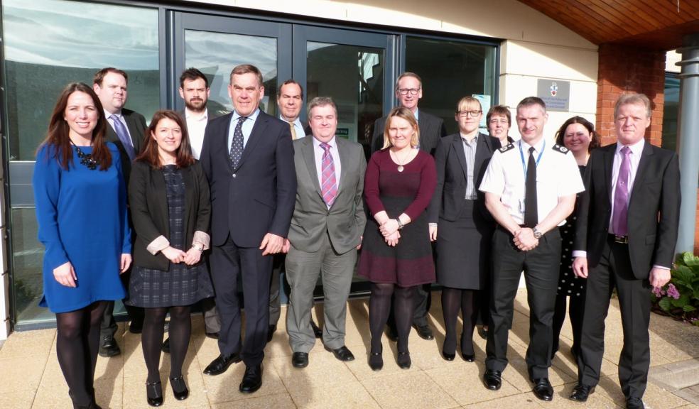 PCC Tony Hogg and DCC Bill Skelly with representatives from supermarkets and retailers