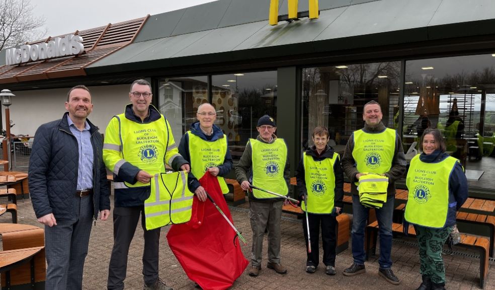 David Shawyer (left), next to Lion President Richard Allen and some of the Budleigh Salterton Lions.