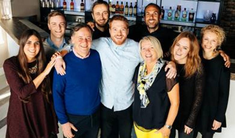 John McCarthy, Josh McCarthy and Barbara McCarthy (centre) with Chivas Brothers employees at the company’s Hammersmith location