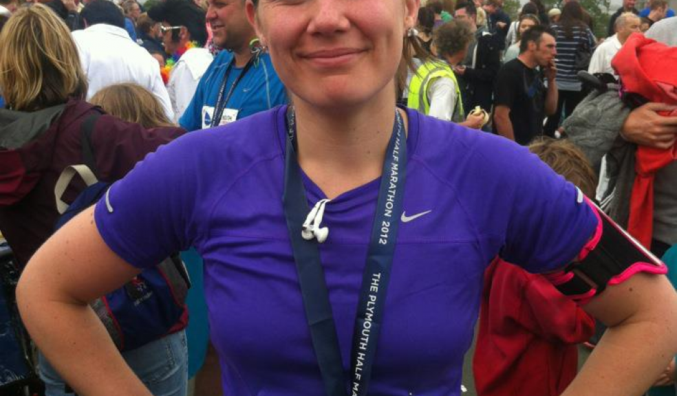 Photo caption: Danni after completing the Plymouth Half Marathon.