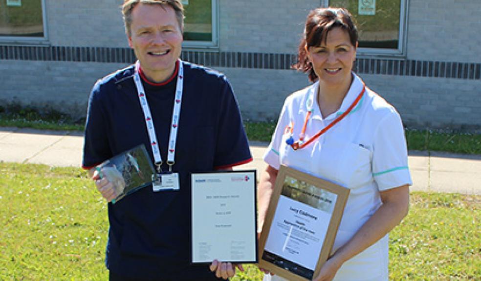 Huw and Lucy with their awards