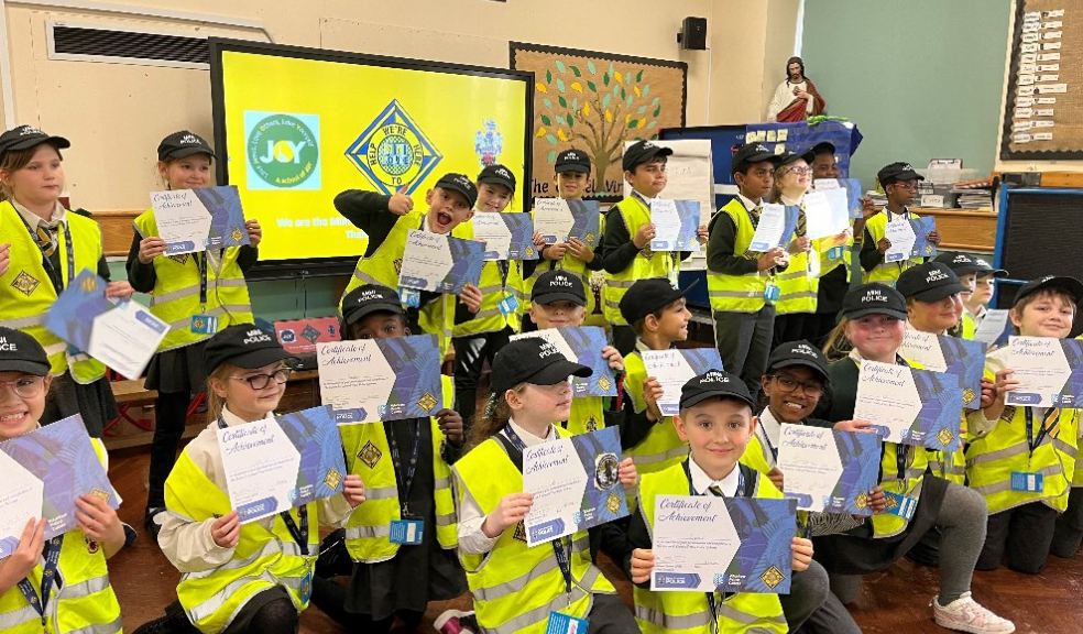 Photo: children receiving their Mini Police certificate