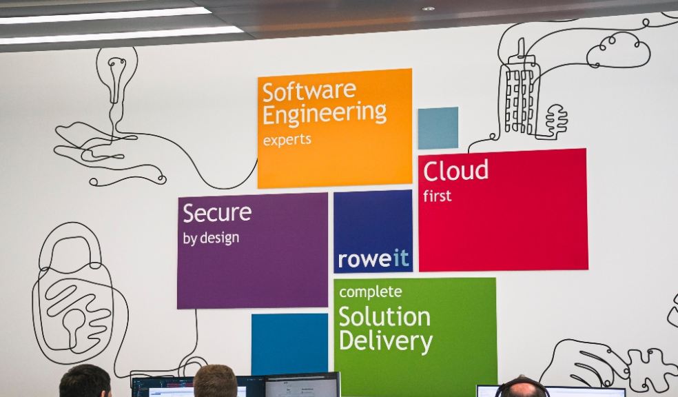image of Rowe IT office wall, featuring multicoloured boxes with the services they deliver