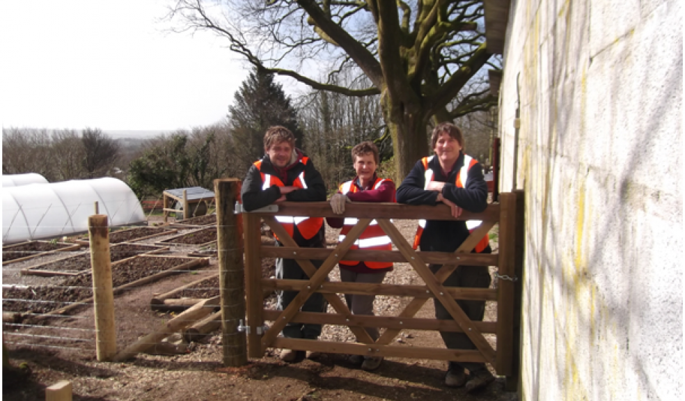 Head gardener David Sharp (right) and other volunteers take a break from their work
