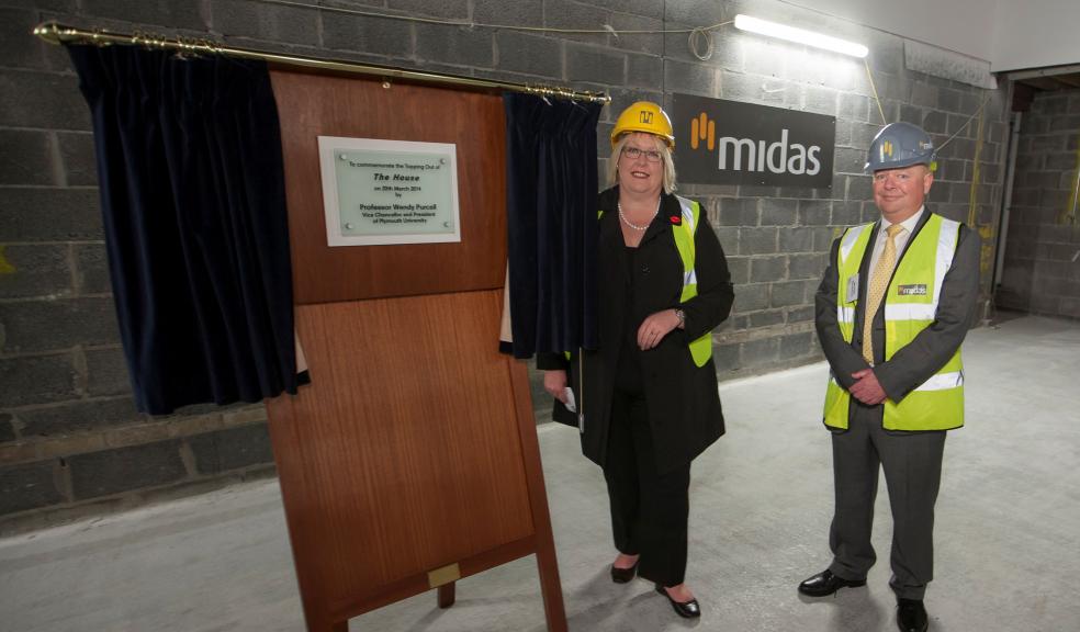 Plymouth University Vice-Chancellor Professor Wendy Purcell, and Mike O’Neil, Midas Construction divisional director for Cornwall and Devon, at the topping out ceremony for The House