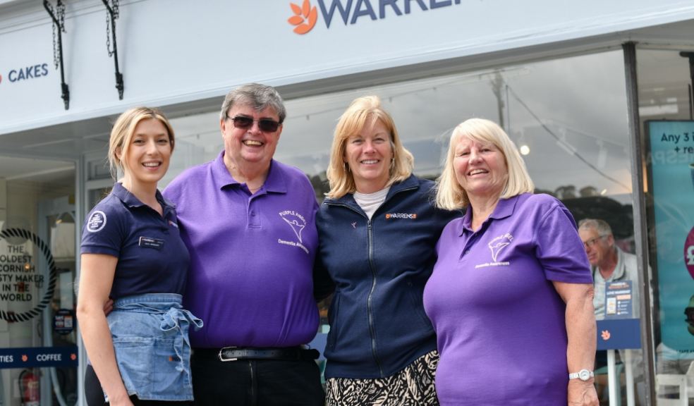 Warrens and dementia awareness people stood outside of warrens