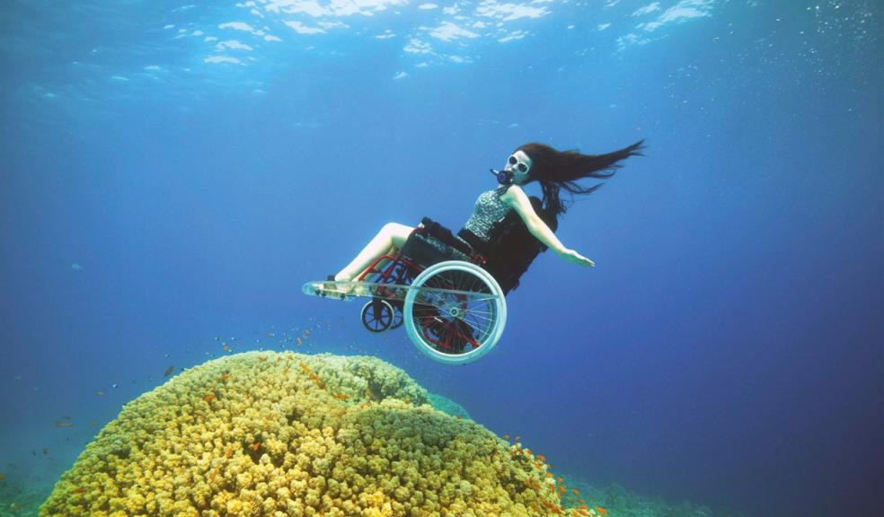 Sue Austin performing in her underwater wheelchair. Credit: artist Sue Austin, Copyright Freewheeling. Photo: Norman Lomax