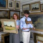 Auctioneers Mary Chilcott and Barnaby Willis with Captain Campbell’s Collection