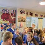 Pupils from St Budeaux CE Primary Academy sang wartime songs with residents at Butterfly Lodge