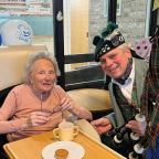 Butterfly Lodge resident Audrey with Dave The Lone Piper