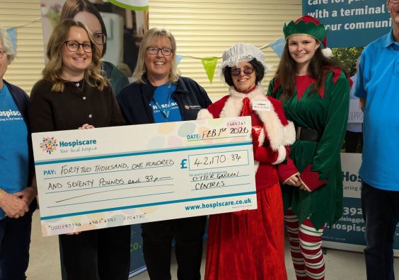 Otter's fundraising cheque for Hospiscare Fundraising cheque for Hospiscare