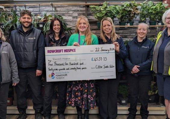 L-R Julie Lee, Lee Webber, Sita Zapata Curtis, Lisa Whittaker from Rowcroft Hospice, Lauren Wasedy, Helen Phipps, Sonja Miller Cheque for Rowcroft Hospice