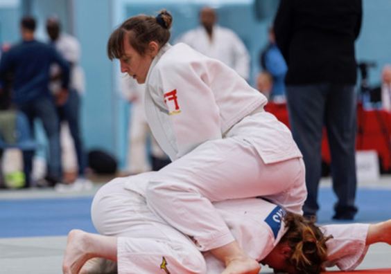 Mum in the middle of judo exercise