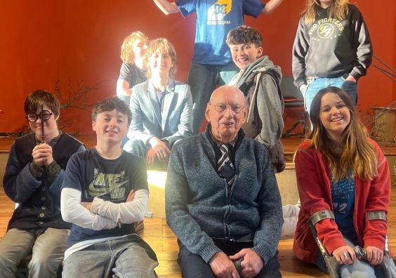 Rehearsals for UNWIPED: Playground Arts Young People's Theatre members with John Osmond (86), whose lived experiences inspired the immersive production bringing generations together at this year's Totnes Fringe Festival.