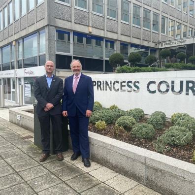 Two directors from The Family Law Company outside Princess Court in Plymouth