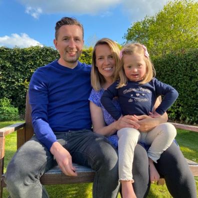 Family sitting on bench