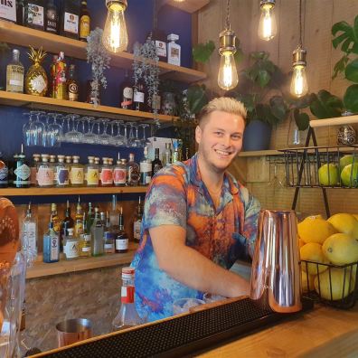 Man behind bar