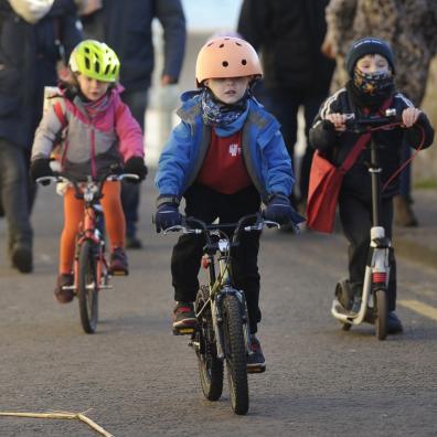 Children walking, cycling and scooting to school
