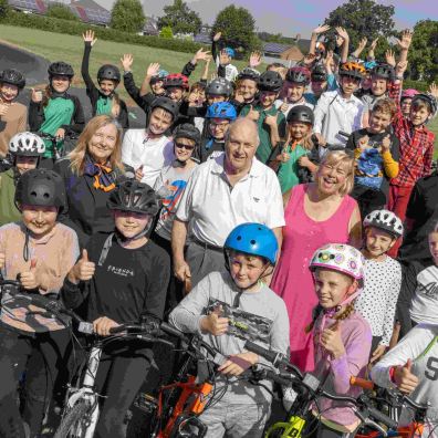 Anne Hawkins, Barry Warren and Jill Moores with local youngsters and Kye Forte at the opening ceremony of the new pump track in Willand.