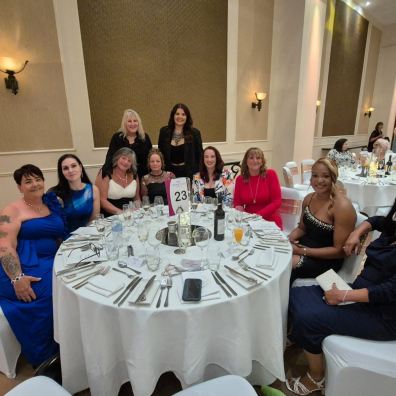 Butterfly Lodge team members at Awards Dinner with manager Clare Sinclair and deputy manager Sarah M