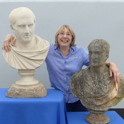 Chilcotts receptionist Jo Neale with the Honiton Pottery marble busts 
