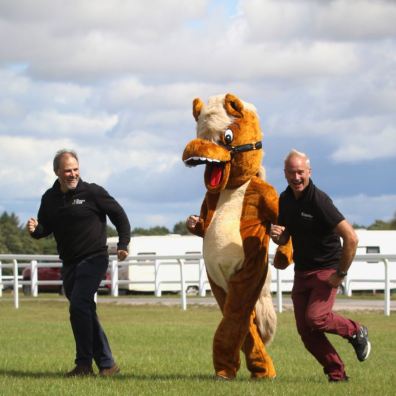 Exeter Racecourse general manager Jack Parkinson, Dexter and clerk of the course Jason Loosemoore