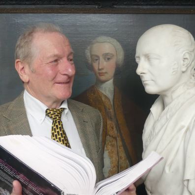 Auctioneer with the marble bust of Irish socialite George Putland