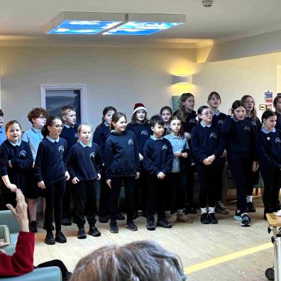 Holsworthy CoE Primary School singing to residents 