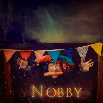 Comedian with carrot in his mouth "Nobby"